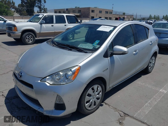 2014 Toyota Prius One with VIN JTDKDTB38E1061202, listed as a IAAI auction lot 42044747 with 133,409 mi miles and . Bid and sale history available at DreamBid. Image 6.