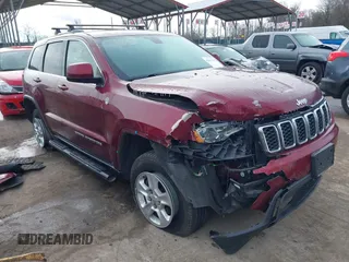 2017 Jeep Grand Cherokee Laredo with VIN 1C4RJFAG1HC844965, listed as a IAAI auction lot 41606739 with 82,144 mi miles. Bid and sale history available at carsss.com. Image 1.