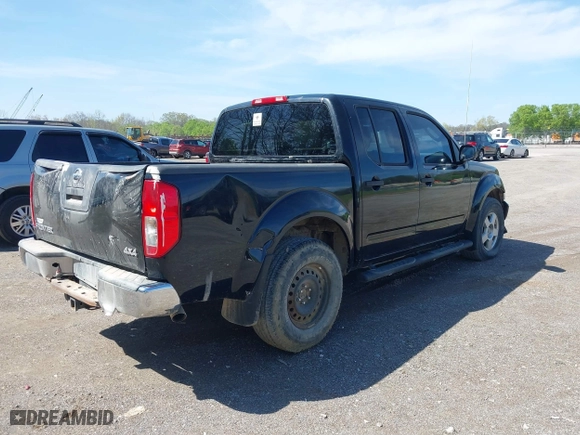 2011 Nissan Frontier PRO-4X with VIN 1N6AD0EV5BC444180, listed as a IAAI auction lot 41943975 with 73,435 mi miles. Bid and sale history available at carsss.com. Image 4.