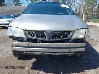 2004 Pontiac Montana z VIN 1GMDU03E94D189934, wystawiony jako IAAI lot #41968925 z przebiegiem 143 411 mil mil oraz . Historia ofert i sprzedaży dostępna na DreamBid. Obrazek 6.