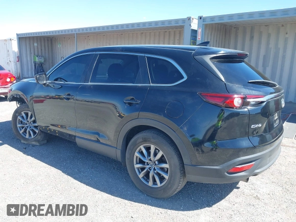 2018 Mazda CX-9 Sport with VIN JM3TCABY8J0223750, listed as a IAAI auction lot 42155429 with 133,543 mi miles and . Bid and sale history available at DreamBid. Image 3.