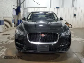2019 Jaguar F-Pace 25t Prestige with VIN SADCK2FX0KA352021, listed as a Copart auction lot 50015475 with 69,786 mi miles and Salvage Title. Bid and sale history available at DreamBid. Image 5.