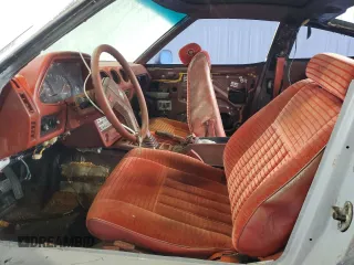 1982 Datsun 280ZX z VIN JN1HZ04S5CX431646, wystawiony jako Copart lot #55607255 z przebiegiem 173 546 mil mil oraz Tytuł czysty. Historia ofert i sprzedaży dostępna na DreamBid. Obrazek 7.