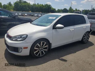 2012 Volkswagen Golf GTI w/Sunroof & Navi PZEV with VIN WVWHD7AJ5CW327924, listed as a Copart auction lot 61104025 with 93,554 mi miles and Salvage title. Bid and sale history available at DreamBid. Image 1.