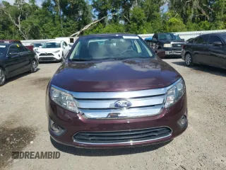 2012 Ford Fusion SE with VIN 3FAHP0HA0CR291458, listed as a Copart auction lot 63357165 with 122,992 mi miles and Salvage title. Bid and sale history available at DreamBid. Image 5.