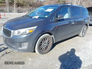 2016 Kia Sedona LX with VIN KNDMB5C17G6083740, listed as a IAAI auction lot 41553959 with 209,536 mi miles. Bid and sale history available at carsss.com. Image 2.