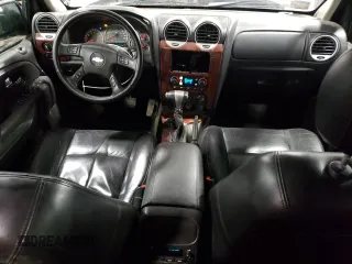 2006 GMC Envoy XL SLE with VIN 1GKET16S666133772, listed as a Copart auction lot 79937194 with 264,374 mi miles and Salvage Title. Bid and sale history available at carsss.com. Image 8.