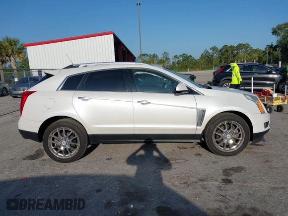 2015 Cadillac SRX Premium Collection with VIN 3GYFNDE32FS530357, listed as a IAAI auction lot 41976585 with 92,335 mi miles and . Bid and sale history available at carsss.com. Image 13.