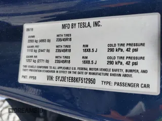 2019 Tesla Model 3 Long Range with VIN 5YJ3E1EB8KF512950, listed as a IAAI auction lot 41836349 with 55,607 mi miles and . Bid and sale history available at DreamBid. Image 9.