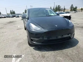 2024 Tesla Model Y Long Range with VIN 7SAYGDEE4RA228916, listed as a Copart auction lot 54921575 with 13,607 mi miles and Salvage title. Bid and sale history available at DreamBid. Image 14.