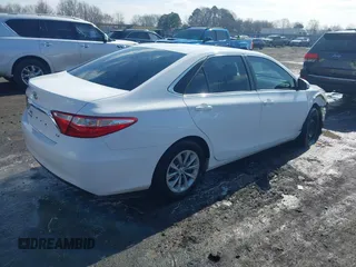 2016 Toyota Camry XLE with VIN 4T1BF1FK1GU155709, listed as a IAAI auction lot 41556465 with 159,923 mi miles and . Bid and sale history available at DreamBid. Image 4.