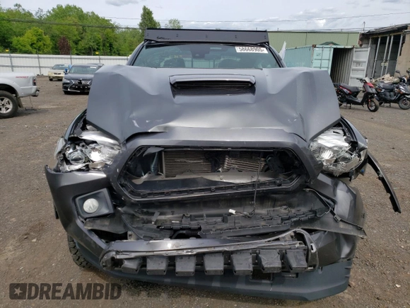 2019 Toyota Tacoma SR z VIN 3TMCZ5AN6KM283109, wystawiony jako Copart lot #58668905 z przebiegiem 44 923 mil mil oraz Szkoda całkowita • Salvage title. Historia ofert i sprzedaży dostępna na DreamBid. Obrazek 5.