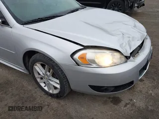 2014 Chevrolet Impala LTZ with VIN 2G1WC5E36E1125283, listed as a IAAI auction lot 41672856 with 150,361 mi miles and . Bid and sale history available at DreamBid. Image 13.