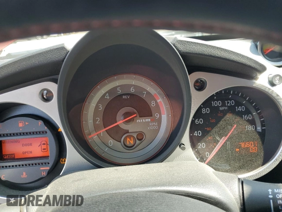 2013 Nissan 370Z Touring z VIN JN1AZ4EHXDM383169, wystawiony jako Copart lot #59787045 z przebiegiem 76 601 mil mil oraz Szkoda całkowita • Salvage title. Historia ofert i sprzedaży dostępna na DreamBid. Obrazek 9.