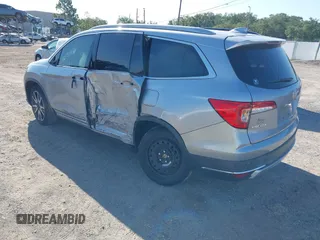 2019 Honda Pilot Elite with VIN 5FNYF6H00KB001016, listed as a IAAI auction lot 42583325 with 133,327 mi miles and . Bid and sale history available at DreamBid. Image 3.