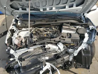 2022 Toyota Corolla Cross LE z VIN 7MUCAAAG0NV034364, wystawiony jako Copart lot #54845725 z przebiegiem 28 200 mil mil oraz Szkody całkowita. Historia ofert i sprzedaży dostępna na DreamBid. Obrazek 12.