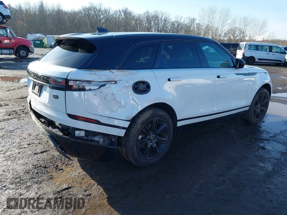2022 Land Rover Range Rover Velar R-Dynamic S z VIN SALYT2EX7NA341627, wystawiony jako IAAI lot #41111238 z przebiegiem 18 982 mil mil oraz . Historia ofert i sprzedaży dostępna na DreamBid. Obrazek 4.