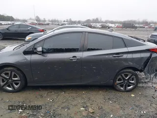 2019 Toyota Prius L Eco z VIN JTDKARFU8K3085918, wystawiony jako IAAI lot #41107891 z przebiegiem 166 295 mil mil oraz . Historia ofert i sprzedaży dostępna na DreamBid. Obrazek 14.