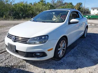 2015 Volkswagen Eos Komfort with VIN WVWBW8AH4FV003067, listed as a IAAI auction lot 41186314 with Not Provided miles and . Bid and sale history available at DreamBid. Image 2.