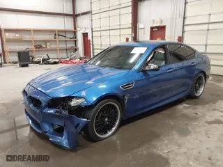 2013 BMW M5 with VIN WBSFV9C58DC772251, listed as a IAAI auction lot 41682321 with NaN miles. Bid and sale history available at carsss.com. Image 16.