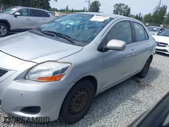 2009 Toyota Yaris with VIN JTDBT903391322248, listed as a IAAI auction lot 40112165 with 193,625 mi miles. Bid and sale history available at carsss.com. Image 6.