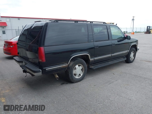 1999 Chevrolet Suburban with VIN 3GNFK16R4XG232727, listed as a IAAI auction lot 42602810 with 121,395 mi miles and . Bid and sale history available at DreamBid. Image 4.