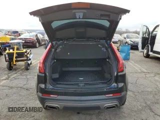 2021 Cadillac XT4 AWD Premium Luxury with VIN 1GYFZDR4XMF016846, listed as a Copart auction lot 82963704 with 44,063 mi miles and Salvage Title. Bid and sale history available at carsss.com. Image 6.