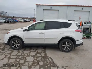 2018 Toyota RAV4 XLE with VIN JTMRFREV6JJ734927, listed as a IAAI auction lot 41510616 with 119,687 mi miles. Bid and sale history available at carsss.com. Image 14.