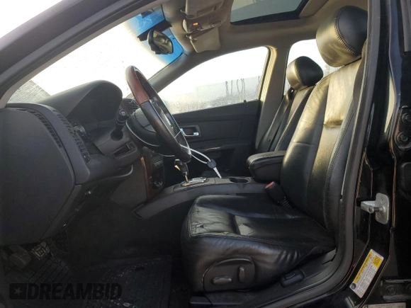 2007 Cadillac CTS with VIN 1G6DP577070186861, listed as a Copart auction lot 41457195 with 148,125 mi miles and Salvage Title. Bid and sale history available at DreamBid. Image 7.