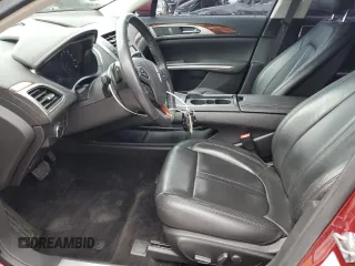 2014 Lincoln MKZ z VIN 3LN6L2JKXER833675, wystawiony jako Copart lot #53023885 z przebiegiem 105 843 mil mil oraz Szkody całkowita. Historia ofert i sprzedaży dostępna na DreamBid. Obrazek 7.
