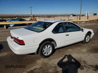 1994 Ford Thunderbird LX with VIN 1FALP62WXRH217279, listed as a Copart auction lot 80512504 with 176,798 mi miles and Salvage Title. Bid and sale history available at DreamBid. Image 3.
