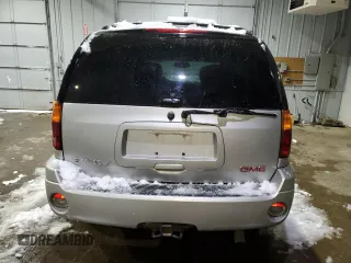 2005 GMC Envoy SLT with VIN 1GKDT13SX52287052, listed as a Copart auction lot 44387855 with 0 mi miles and Salvage Title. Bid and sale history available at carsss.com. Image 6.