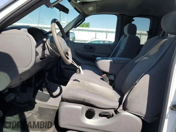2003 Ford F-150 XL with VIN 1FTRX18L63NA76059, listed as a Copart auction lot 60846555 with 57,346 mi miles and Salvage title. Bid and sale history available at DreamBid. Image 7.