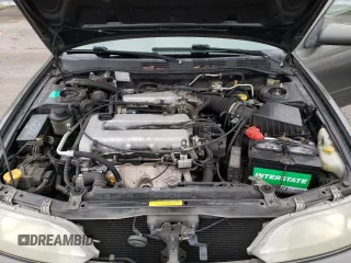 2000 Infiniti G20 Luxury z VIN JNKCP11A5YT303404, wystawiony jako Copart lot #82801234 z przebiegiem 178 185 mil mil oraz Tytuł czysty. Historia ofert i sprzedaży dostępna na DreamBid. Obrazek 11.