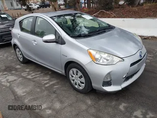 2014 Toyota Prius One with VIN JTDKDTB33E1067408, listed as a IAAI auction lot 41573895 with 245,383 mi miles and . Bid and sale history available at DreamBid. Image 1.