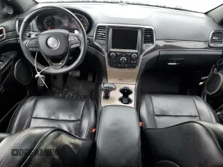2015 Jeep Grand Cherokee High Altitude with VIN 1C4RJFCG2FC196563, listed as a Copart auction lot 56302315 with 143,759 mi miles and Salvage title. Bid and sale history available at DreamBid. Image 8.