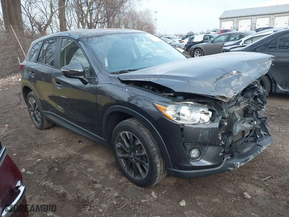 2016 Mazda CX-5 Grand Touring with VIN JM3KE4DYXG0684638, listed as a IAAI auction lot 41101563 with NaN miles. Bid and sale history available at carsss.com. Image 1.