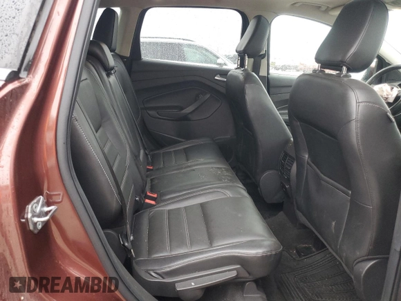 2018 Ford Escape Titanium z VIN 1FMCU0J93JUA70449, wystawiony jako Copart lot #59303245 z przebiegiem 165 907 mil mil oraz Szkoda całkowita • Salvage title. Historia ofert i sprzedaży dostępna na DreamBid. Obrazek 10.