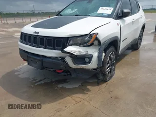 2020 Jeep Compass Trailhawk with VIN 3C4NJDDB3LT118928, listed as a IAAI auction lot 42128120 with 95,477 mi miles and . Bid and sale history available at DreamBid. Image 6.