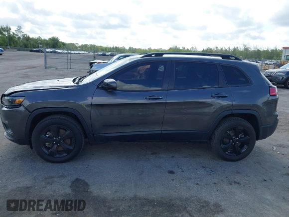 2021 Jeep Cherokee Latitude Plus with VIN 1C4PJMLB6MD117029, listed as a IAAI auction lot 42167039 with 68,717 mi miles and . Bid and sale history available at DreamBid. Image 14.