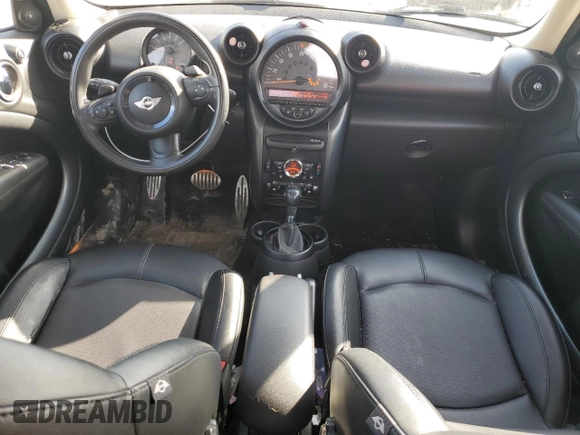 2016 MINI Countryman S with VIN WMWZC5C5XGWU03443, listed as a Copart auction lot 48915215 with 105,030 mi miles and Salvage Title. Bid and sale history available at DreamBid. Image 8.