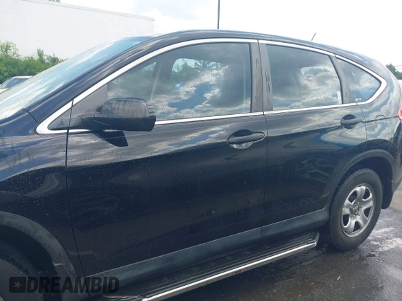 2012 Honda CR-V LX with VIN 2HKRM4H34CH603400, listed as a IAAI auction lot 42230733 with 142,571 mi miles and . Bid and sale history available at DreamBid. Image 14.