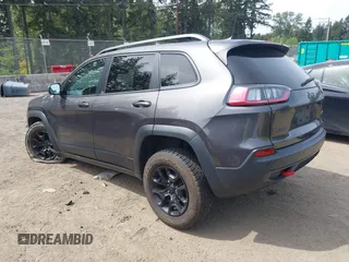 2019 Jeep Cherokee Trailhawk with VIN 1C4PJMBX2KD231734, listed as a IAAI auction lot 42235469 with 104,565 mi miles and . Bid and sale history available at DreamBid. Image 3.