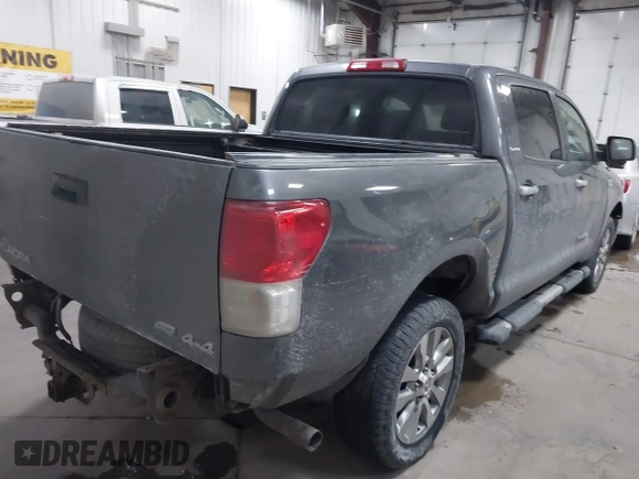 2012 Toyota Tundra 4WD Truck LTD with VIN 5TFHW5F14CX267765, listed as a IAAI auction lot 41345269 with 221,400 mi miles. Bid and sale history available at carsss.com. Image 4.