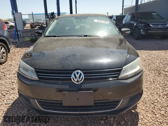 2014 Volkswagen Jetta TDI w/Premium with VIN 3VWLL7AJ8EM402757, listed as a Copart auction lot 52201895 with 99,475 mi miles and Salvage title. Bid and sale history available at DreamBid. Image 5.