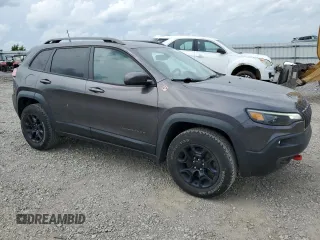2020 Jeep Cherokee Trailhawk Elite with VIN 1C4PJMBNXLD549505, listed as a Copart auction lot 53468925 with 88,991 mi miles and Salvage title. Bid and sale history available at DreamBid. Image 4.