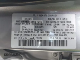 2014 Mazda CX-5 Touring z VIN JM3KE2CYXE0322943, wystawiony jako IAAI lot #41934670 z przebiegiem 110 690 mil mil oraz . Historia ofert i sprzedaży dostępna na DreamBid. Obrazek 9.