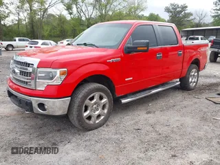 2014 Ford F-150 XL with VIN 1FTFW1ET0EFA05463, listed as a IAAI auction lot 42037670 with 219,154 mi miles and . Bid and sale history available at DreamBid. Image 2.