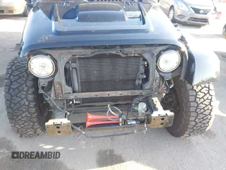 2017 Jeep Wrangler Unlimited Sahara with VIN 1C4BJWEG5HL635319, listed as a IAAI auction lot 42224748 with 141,214 mi miles and . Bid and sale history available at DreamBid. Image 18.