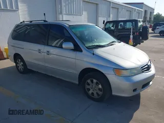 2004 Honda Odyssey EX-L z VIN 5FNRL180X4B005559, wystawiony jako IAAI lot #41922428 z przebiegiem 159 433 mil mil oraz . Historia ofert i sprzedaży dostępna na DreamBid. Obrazek 1.